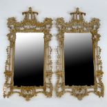 Pair of 20th Century Carved and distress painted Chinoiserie style mirrors. Unsigned. Overall good
