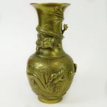 Antique Chinese Brass Relief Vase. Signed with symbols on bottom. Good condition. Measures 9-1/4"