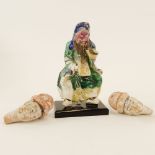 Two (2) Chinese Terra Cotta Bobbing Heads and a Glazed Pottery Scholar Figure. The Gallery Has