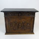 19/20th Century Continental Renaissance style Carved Walnut Cabinet with Later Slate Top.