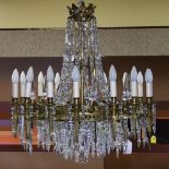 Early 20th Century Bronze and Crystal Twenty-Four (24) Light Chandelier. Unsigned. Good condition.