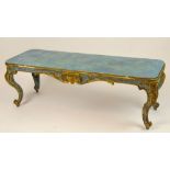 Early to mid 20th Century Venetian style carved painted parcel gilt wood coffee table/bench.