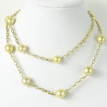 Champagne Pearl and 14 Karat Yellow Gold Necklace. Pearls measure 12-15mm. Signed 14K. Very good