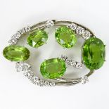 Vintage 2.0-2.25 Carat Diamond, Peridot and 14 Karat White Gold Brooch. Diamonds E-F-G Color, VS