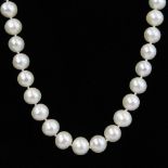 Lady's White Pearl Necklace with Diamond and 14 Karat White Gold Clasp. Pearls measure 9mm each.