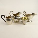 Lot of Four German 800, 835 Silver Tabletop Items. Includes, pitchers, sauce boat and cup. Signed.