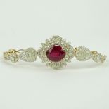 AIG Certified 6.77 Carat Oval Cut Ruby, 3.34 Carat Round Cut Diamond and 14 Karat Yellow Gold