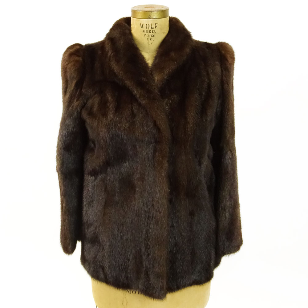Dark Brown Mink Jacket. Fully lined. No label. Very good condition. Size 12. Length 28". Shipping $