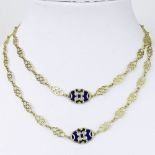 18 Karat Yellow Gold and Enamel Necklace. Clasp signed 750. Very good condition. Measures 33" L.