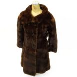 Vintage Double Breasted Brown Mink Coat. Lined. No label. Good condition. Size small, 38" L.