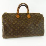 Vintage Louis Vuitton Monogram Canvas Hand Bag. Signed to Lock. Worn condition, small holes.