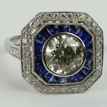 Lady's Approx. 1.35 Carat Round Brilliant Cut Diamond, .85 Carat Sapphire and Platinum Ring accented