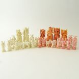 Lot of 32 Carved Ivory Chess Pieces (16 white, 16 colored). Unsigned. Good condition. Tallest