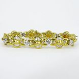 Lady's Approx. 4.50 Carat Tapered Baguette, .50 Carat Round Cut and 18 Karat Yellow and White Gold
