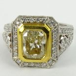 Approx. 1.75 Carat Radiant Cut Fancy Yellow Diamond and 18 Karat White and Yellow Gold Engagement