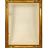 Large 19/20th Century Carved and Gilt Wood Frame. Measures 58" by 43". Losses and rubbing