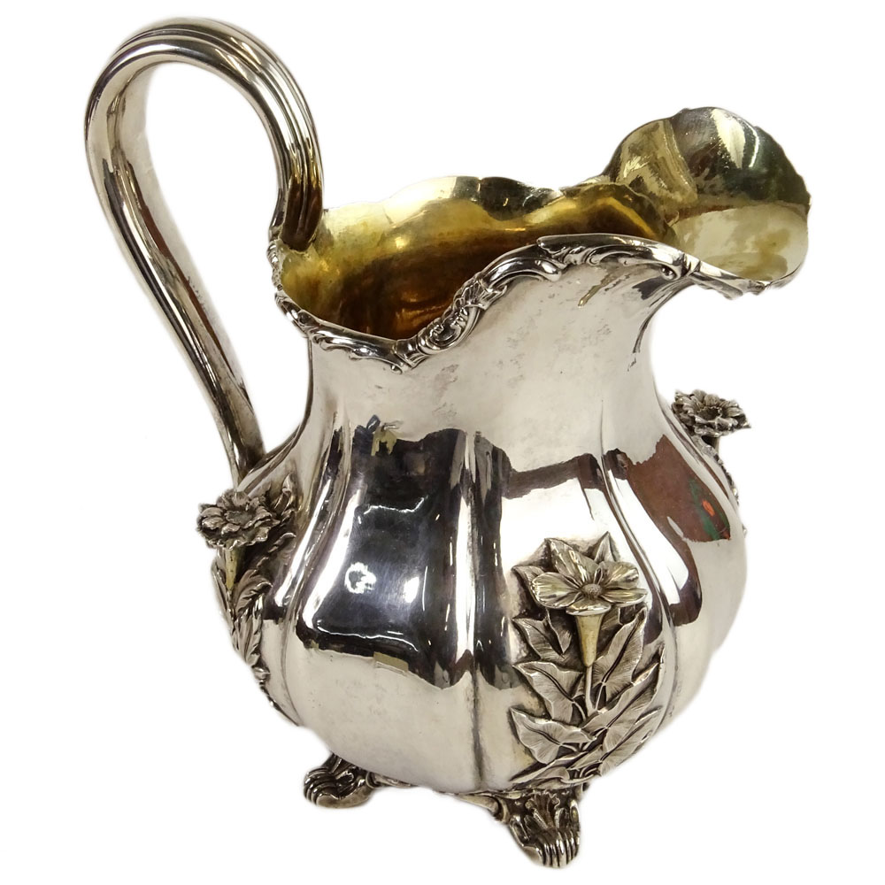 Early 19th Century German 875 Silver Footed Pitcher With Relief of Flowers. Signed with German