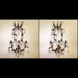 Early to Mid 20th Century Iron, Gilt Tole and Crystal Twelve Light Chandelier. Unsigned. Surface