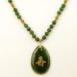 Vintage Spinach Jade and 14K Gold Beaded and Pendant Necklace. Signed 14K on pendant bale. Light