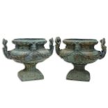 Pair of bronze jardinières with mermaid handles and figural motif. Green patina. Good condition.