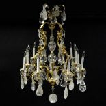 Contemporary Louis XV-style Gilt Bronze, Crystal and Rock Crystal Twelve (12) Light Chandelier.