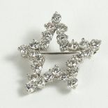 Vintage Approx. 2.50 Carat Round Cut Diamond and 18 Karat White Gold Star Brooch. Diamonds F-G