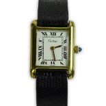 Lady's Vintage Cartier Tank Manual Movement Watch with Leather Strap. Surface wear from normal