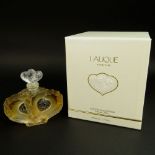 Boxed Lalique 1.7 fl. Oz Eau de Parfum Double Heart Bottle. Signed. As new unused in box. Bottle