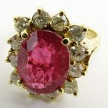 GLA Certified 3.57 Carat Oval Cut Ruby, 1.03 Carat Round Cut Diamond and 14 Karat Yellow Gold