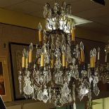 Louis XV Style Wrought Iron and Crystal 12 Arm Cage Chandelier. 16 Lights total. Unsigned. Good