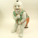 Mid 20th Century Chinese Porcelain Large Figure of a Boy With Fish. Unsigned. Good condition.