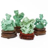 Set of four (4) Vintage Chinese Carved Turquoise Figurines on Hardwood Stands. One with