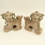 Pair Modern Chinese Pottery Foo Dogs. Unsigned. Good condition. Measures 9" H x 9" L. Shipping $65.