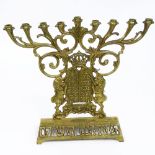 Vintage Brass Menorah. Signed Oppenheim Israel. Light wear or in good condition. Measures 10-1/2"