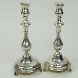 Pair of Silver Plate Candlesticks. Unsigned. Split on one top. Measures 12" H. Shipping $48.00