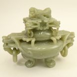 Mid Century Chinese Carved Jade Censer. Carved in high relief of mythical beasts. Ring handles.