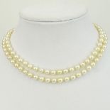 Vintage Double Strand White Pearl Necklace with 14 Karat White Gold and Diamond Clasp. Pearls