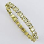 Stunning Diamond, Platinum and 18 Karat Yellow Gold Bracelet Set with Twenty-One (21) Cushion Cut