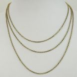 Vintage 10 or 12 Karat Yellow Gold Long Necklace. Unsigned. Good condition. Measures 58-1/2" L.