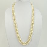 Long Vintage Double Strand White Pearl Necklace with 14 Karat Yellow Gold Clasp with Small Diamond