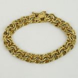 Antique 14 Karat Yellow Gold Charm Bracelet. Signed 14K. Good vintage condition. Measures 3/8" W, 7"