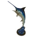 R. Arango Painted Bronze Sculpture "Caribbean Blue". Signed R. Arango and Numbered 4/199. Minor