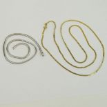 Two (2) 14 Karat Gold Necklaces, One White Gold, One Yellow Gold. Signed. Good condition. Measure: