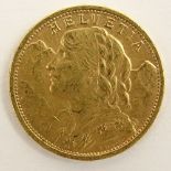 Swiss1912 20 Franc Gold Coin. The gallery does not grade coins. Weight: 4.10 pennyweights.