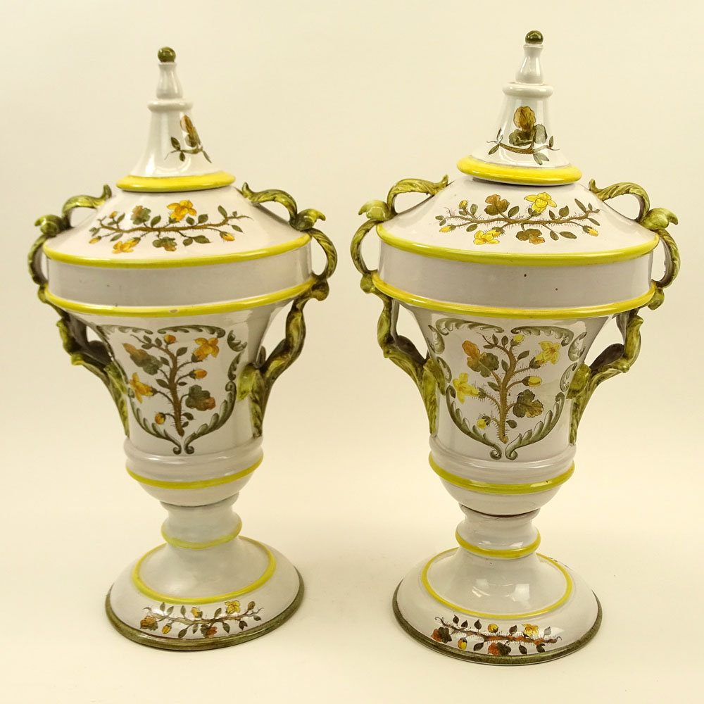 Pair of Large Italian Majolica Handled Urns. Hand painted Floral Motif. Signed Italy. Restoration to