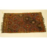 Vintage Moroccan Kilim Rug. Unsigned. Faded, wear, stains. Measures 60" x 105". Provenance: