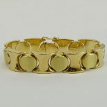 Vintage 14 Karat Yellow Gold XO Bracelet. Signed 585. Good vintage condition. Measures 5/8" W, 7-1/