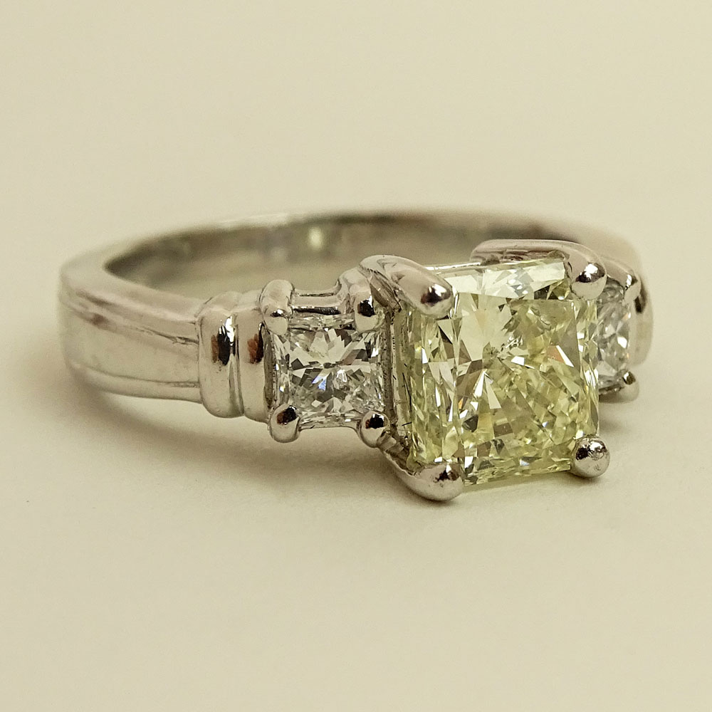 Diamond and Platinum Three Stone Engagement Ring, set in the center with an Approx. 2.01 Radiant Cut