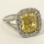 Important EGL Certified 5.22 Carat Cushion Cut Fancy Intense Yellow Diamond and 18 Karat White