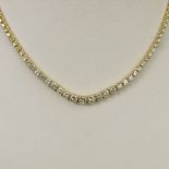 Lady's Approx. 10.27 Carat Round Brilliant Cut Diamond and 14 Karat Yellow Gold Necklace. Diamonds